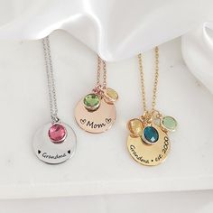 "Round necklace with your kids birthstones, the dainty coin can be engraved with names and symbols,  a great gift for mom, new moms, sister and grandma, you can purchase the necklace with up to 10 birthstones of your choice. The necklace is engraved on the front only, if you want a message engraved on the back you can purchase the extra side engraving following this link, please select the option TEXT: https://www.etsy.com/ca/listing/1516288937/add-on-personalization-engraving?click_key=ddc4ed739d39c0ce77e302cba362f062a9e68b2e%3A1516288937&click_sum=6c692b9f&ga_search_query=add%2Bon&ref=shop_items_search_3&frs=1&crt=1 We engrave each item in our studio, using a laser engraving process that creates a very precise and detailed image, the machine creates a darker tone image with no ink, this Grandma Necklace Birthstone, Grandma Jewelry, Birthstone Jewelry Mothers, Mom Necklace Personalized, Grandma Necklace, Personalized Grandma Gifts, Mama Necklace, Zodiac Sign Necklace, Family Necklace