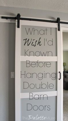 an open sliding door with the words what i wish i'd known before hanging double barn doors