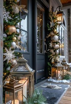 christmas decorations on the front door of a house with lights and ornaments hanging from it