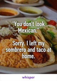 a white plate topped with tacos and rice