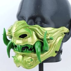 Carefully sculpted to resemble an Oni a fearsome demon mask originating from Japanese folklore our Samurai Oni Demon Mask is ideal for cosplay enthusiasts, venturing into the mysterious world of samurai. Details: We have padded the inside of the mask for your facial comfort. The mask can stay on your face for a long time in the activity you use. It does not cause pain on your face and you can breathe comfortably. It is very robust in your activities with its high filling and extra layer thicknes Warrior Style Masks For Cosplay And Masquerade Events, Samurai Masks For Halloween Cosplay, Cyberpunk Masks And Prosthetics For Halloween, Fantasy Masks For Halloween Cosplay, Fantasy Style Masquerade Mask For Cosplay Events, Fantasy Full Face Masks For Halloween, Fantasy Halloween Cosplay Masks, Fantasy Full Face Halloween Masks, Full Face Fantasy Halloween Masks