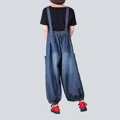 Introducing our 2023 Autumn Collection of 90s-inspired mid wash denim dungarees ââ‚?a timeless classic that's set to revolutionize your wardrobe!Why They're Your Next Wardrobe EssentialDesigned to bring back the nostalgic vibes of the '90s. these denim dungarees are the perfect balance between contemporary fashion and vintage style. With their unique baggy fit and suspender closures. they exude an effortlessly cool attitude that's sure to make a statement.Distinctive Features: 90s-Inspired Style Retro Dark Wash Cotton Denim Jumpsuit, Baggy Denim Blue Jeans Overall, Denim Blue Washed Overall Jeans, Baggy Medium Wash Cotton Overalls, Dark Wash Baggy Overalls, Denim Overalls With Relaxed Fit, Dark Wash Wide Leg Relaxed Fit Overalls, Relaxed Fit Dark Wash Denim Overalls, Dark Wash Relaxed Fit Overalls