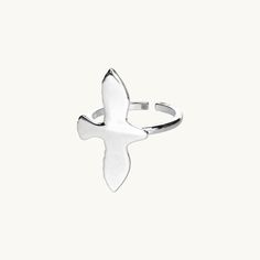 An adjustable ring with our signature piece, Dove. A timeless piece that carries with it a profound message of hope and peace, making it not just a piece of jewelry but a symbol to cherish. It is not only a personal keepsake but also a thoughtful gift. Measurements: x 16 mm.Material: Sterling silver. Nickel Free Sterling Silver Jewelry In Bird Shape, Silver Dove Necklace, Nickel-free Bird-shaped Jewelry Gift, Dove Jewelry, Silver Bird-shaped Jewelry For Gift, Silver Ring Designs, Message Of Hope, Adjustable Rings, Timeless Pieces