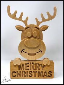 a wooden christmas sign with a reindeer's head on it that says merry christmas