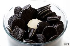 a bowl filled with chocolate cookies and oreos