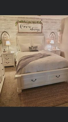 a white bed sitting in a bedroom on top of a carpeted floor next to a dresser