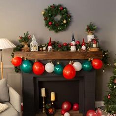 a living room decorated for christmas with red, white and green decorations on the mantle