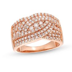 a rose gold ring with white diamonds