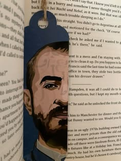 a bookmark with an image of a man's face on it