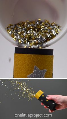 a person is throwing confetti into a cup with gold and silver sprinkles