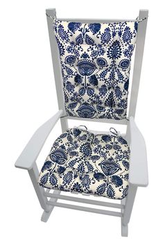 a blue and white chair with an umbrella on it's seat cushion is sitting in front of a white background