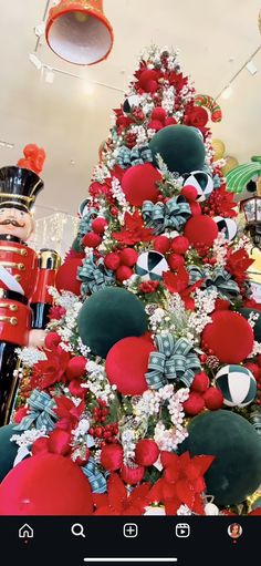 a christmas tree decorated with red and green decorations