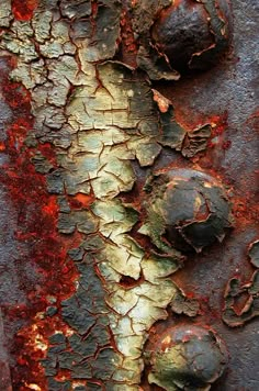 an old rusted metal surface with peeling paint