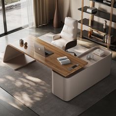 an office desk with a laptop on it in front of a large window and bookshelf