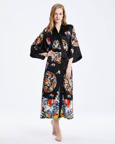 The mulberry silk kimono print robe is, soft color, soft and comfortable, and silky skin-friendly, the combination of pure mulberry silk material and exquisite digital inkjet printing is more elegant and luxurious. Sexy V-neck, showing the soft line of the neck and modifying the face. The loose three-quarter sleeves are comfortable and easy for the wrist to move freely. The waist tie design breaks mediocrity, improves the waistline, and shows the perfect proportion. Inner ties design, Inner ties Black Spring Sleepwear For Home, Silk Long Kimono For Loungewear, Long Sleeve Night Robe For Spring, Summer Long Sleeve Night Robe, Spring Open Front Home Robe, Silk Wrap Kimono For Loungewear, Silk Long Sleeve Home Robe, Long Sleeve Silk Robe, Long Sleeve Silk Robe For Home