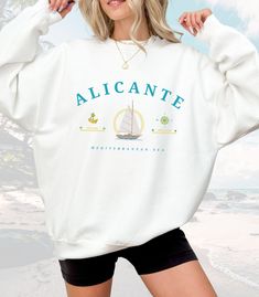 PRODUCT DETAILS & SIZING 10% OFF 3-5 Items | Code: GROUP3 15% OFF 6-19 Items | Code: GROUP5 20% OFF 20+ Items | Code: GROUP20 Alicante, a vibrant port city on Spain's Costa Blanca, is known for its beautiful Mediterranean beaches, historic sites, and lively atmosphere. Highlights include the imposing Santa Bárbara Castle with panoramic views, the bustling Explanada de España promenade, and the scenic Postiguet Beach. Our Alicante sweater is available in multiple different colors. Made from high- Cadaques Spain, Big Sweaters, Coral Reefs, Sweater Fits, Sierra Nevada, Florida Keys, Yacht Club, Water Activities, Alicante