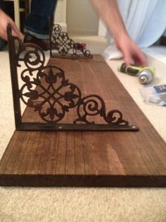 a man is working on a piece of wood that has been made into a table