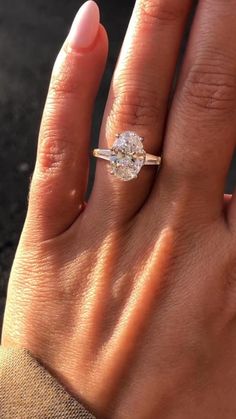 3Carat Oval Cut Diamond With Side Tapered Baguette Diamond Engagement Ring Three Stone Ring Wedding Gifts For Women Bridal Ring Trilogy Ring, Moissanite Diamond Ring, OVal Cut Ring, Bridal Ring, Gifts For Women , Rings For Women, 14k Gold Ring , Silver Ring, Platinum Ring, Oval Cut Moissanite Ring. 𝐃𝐞𝐬𝐜𝐫𝐢𝐩𝐭𝐢𝐨𝐧 𝐨𝐟 𝐑𝐢𝐧𝐠 ● 𝐂𝐞𝐧𝐭𝐞𝐫 𝐃𝐢𝐚𝐦𝐨𝐧𝐝 𝐃𝐞𝐭𝐚𝐢𝐥𝐬 → Shape: Oval Cut Moissanite → Carat: 3.0  CT  → Color: E-F → Clarity: VS-VVS → Measurement and Carat Weight:  12X8 MM  Side Stone Detail :-  ⇒Type of Diamond: Moissanite ⇒Shape: Tapered Baguette Cut  ⇒Weight: 0.45 CT  ⇒Color: D (White/colorless) ⇒Clarity: VVS1 ⇒Cut: Excellent 𝐓𝐡𝐞 𝐬𝐭𝐨𝐧𝐞𝐬 𝐢𝐧 𝐣𝐞𝐰𝐞𝐥𝐫𝐲 𝐚𝐫𝐞 𝟏𝟎𝟎% 𝐡𝐚𝐧𝐝-𝐜𝐫𝐚𝐟𝐭𝐞𝐝 𝐢𝐭 𝐢𝐬 𝐜𝐮𝐭 𝐚𝐧𝐝 𝐩𝐨𝐥𝐢𝐬𝐡𝐞𝐝 𝐛𝐲 𝐨𝐮𝐫 𝐞𝐱𝐩𝐞 Oval Tapered Baguette Engagement Ring, Oval Engagement Ring With Tapered Baguettes, Oval And Baguette Engagement Ring, Oval With Baguettes Ring, Oval Engagement Ring 3 Stone, Oval Engagement Ring With Side Stones, Oval Trilogy Engagement Ring, Oval Three Stone Engagement Ring, Three Stone Engagement Rings Oval