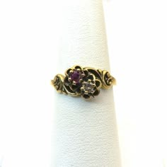 Absolutely beautiful Antique 14k gold diamond and garnet flower ring would make for a very beautiful and unique engagement ring. Or a perfect gift for yourself. this ring is a US size 6 1/2 it weight 3.23 grams the band width at the back of the ring is 2.1mm the face of the ring measures 9.2mm x 10.6mm garnet measures 3.1mm diamond measures 3mm this ring is marked on the inner band. this is such a unique style. PLEASE BE ADVISED SOME PHOTOS ARE CLOSEUPS TO SHOW DETAIL, PLEASE READ FULL DESCRIPTI Vintage Heart Ring, Antique Style Jewelry, Gold Jewellery Collection, Aesthetic Rings, Antique Jewelry Rings, Handwriting Styles, Fancy Rings, Unique Engagement Ring, Indian Jewelry Sets