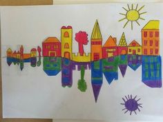 a drawing of a city with buildings and sun in the sky, on white paper