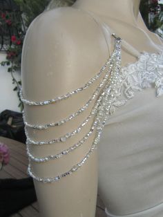 Handmade item Shoulder Necklace Bridal shoulder necklace 2 pieces per order. handcrafted Crystal Detachable Strap made to order Please get in touch for more information. Thank you so much for choosing my store. It is very importent to let my customers happy, so dont hesitate to contact me for your questions. Standart shipping I ship from Turkey , General delivery durations are USA : 12 /20 days Canada : 10/20days Australia: 15/25 days Shoulder Necklace Wedding, Pearl Shoulder Jewelry, Beaded Clothes, Shoulder Beads, Wedding Dress Straps, Shoulder Accessories, Straps Wedding Dress, Beaded Sleeves, Jewelry Dress