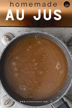 a pot filled with liquid sitting on top of a stove