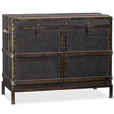 an old chest with metal studs on the front and sides, sitting against a white background