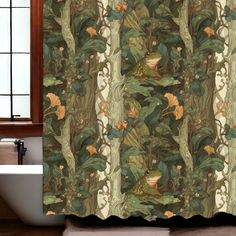 a shower curtain with an image of trees and flowers on it in front of a bathtub