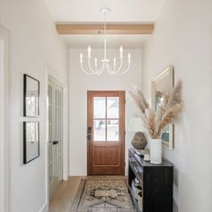 the hallway is clean and ready for us to use as an entrance way in this home