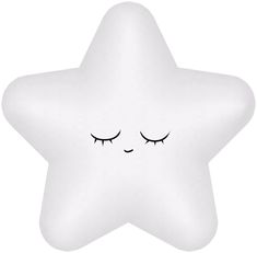 a white star shaped pillow with eyes closed