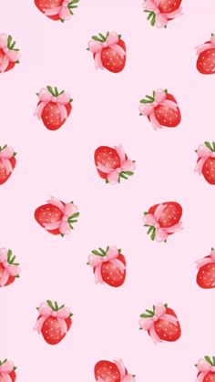 a pink background with strawberries on it