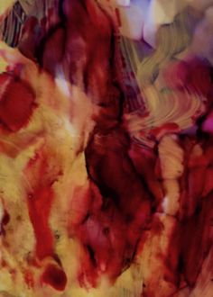 an abstract painting with red and yellow colors