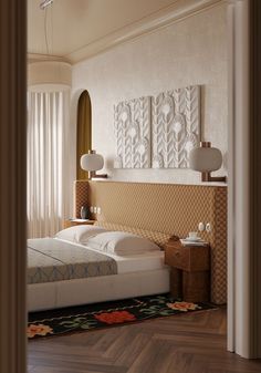 a bed sitting in a bedroom on top of a hard wood floor next to a window