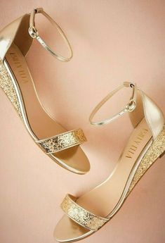 Brand New (No Box)  Anthropologie / BHLDN / Billy Ella CRISTAL Wedges MSRP: $150.00 Size:  7 / 7.5 / 9 / 9.5 Style No. 39854740 Comfort meets glamour with these glitter-bedecked wedges - a versatile choice for any soiree. Details & Care: *Only Available at BHLDN *Adjustable Buckle Closure *Vegan Leather Upper *2" Glitter Heel *Handmade *Imported **May have minor nicks from being handled in a retail store; additional photos upon request** Stock photos included in listing. Color variation may occu Elegant Gold Wedge Sandals For Wedding, Gold Open Toe Wedge Sandals For Wedding, Gold Wedge Heel Sandals For Wedding, Gold Wedge Sandals For Wedding, Gold Wedding Wedge Sandals, Gold High Heel Wedge Sandals For Wedding, Gold Sandals With Glitter Accents For Formal Occasion, Gold Open Toe Sandals As Gift, Elegant Gold Sandals