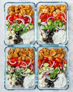 four glass containers filled with different types of salads and meats on top of each other