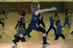 a group of people in a dance class