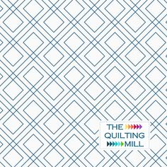 the quilt mill logo on a white background with blue and green geometric shapes in squares