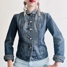 "90s vintage denim jean jacket by French designer Marithé Francois Girbaud     - Fitted tailored silhouette     - Intricate dart and seaming details     - Rolled collar with contrasting stripe fabric     - Girbaud emblem snaps     - Unlined     - Unique shoulder details     - whiskering at elbows     - nonstretch medium wash denim REFER TO THESE MEASUREMENTS CAREFULLY, AS RETURNS ARE NOT ACCEPTED: Marked size Medium...runs small...fits like a size small.      Pit to pit: 18.5\"     Waist: 16\"     Hip: 17.5\"     Sleeve length: 25.5\" (meant to be rolled up)     Length (midshoulder - hem): 20\"     Shoulder tip to tip: 16\" Excellent used condition  Shell: 100% Cotton  Military, rocker, chorewear, workwear, streetwear, utility, menswear To complete the look, Sangre de Cristo Vintage origin Reworked Fitted Cotton Denim Jacket, Fitted Retro Denim Jacket For Streetwear, Reworked Long Sleeve Medium Wash Denim Jacket, Vintage Button-up Spring Jeans, Vintage Reworked Denim Jacket For Spring, Vintage Button-up Jeans For Spring, Reworked Vintage Denim Jacket For Spring, Casual Reworked Denim Jacket, Fitted Y2k Denim Jacket