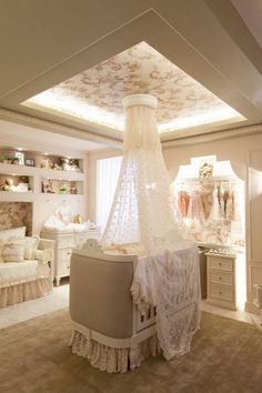 a white canopy bed sitting in a bedroom on top of a carpeted floor next to a dresser