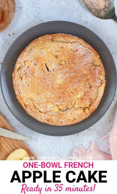 an apple cake with powdered sugar on top and the words, one - bowl french apple cake ready in 35 minutes