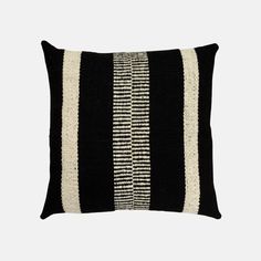 a black and white striped pillow