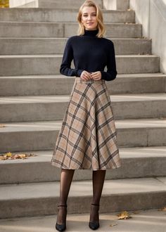 The skirt is very warm and cozy in wool, with a mid-length that hits just at mid-calf and an A-line fit as well as just the right amount of plaid. ★★ FEATURES * 30% wool, 30% fiber, 40% polyester * Polyester lining * Two side seam pockets * Right zipper closure * back little elastic band * Plus size full skirt * A Line Skirt * Perfect for Winter, autumn * Dry clean ★★ The model is 170 cm (5′ 7″) tall with a 80 cm (31.5") bust, 66 cm (26") waist. She is wearing the plaid wool skirt in size XS. ★★ Bespoke Order Service If you Request other color Request the length Your height is not between 155 cm- 172 cm Your weight is over 75 kg I can do it for you, It will need some extra fee depending on on your need. Contact with me for more detail. ★★ Get your size in Size Chart with your body measurem Cool Winter Fall Outfits, Wool Skirt Outfit Fall, Vintage Wool Skirt Outfit, Women Fall Casual Outfits, Professional Christmas Outfits, Vintage A Line Skirt, 1950 Fall Fashion, Library Chic Fashion, Plaid Skirt Outfit Work