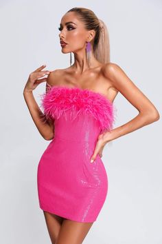 The compliments won't stop rolling in when you're wearing the Roto Sequin Feather Mini Dress! Comfortable fabric with sparkly sequins, shapes a seamed bodice with strapless neckline, while a bodycon mini skirt hugs your curves below a fitted waist.? The design of feather giving you a mesmerizing detailing that sparkles effortlessly. Just add a pair of sweet heels can finish the look!    Fabric composition: 100% polyester  Washing method: hand wash  Model wearing size S  Model Stats:Height-68.5"/ Pink Sequin Party Dress, Mode Rose, Goth Outfit, Tube Top Dress, Sequin Party Dress, Summer Dress Outfits, Stylish Clothes For Women, Pink Sequin, Hip Dress