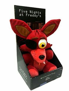 a red stuffed animal in a black box