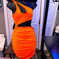 Cut Out Dress Orange One-shoulder Mini Dress For Night Out, Orange Knee-length Mini Dress For Night Out, Orange One-shoulder Dress For Night Out, Fitted Sundress Mini Dress With Cutout, Fitted Sundress With Cutout, Orange Cutout Dress For Summer, Orange Cutout Summer Dress, Summer Orange Cutout Dress, Flirty Orange Bodycon Dress For Spring