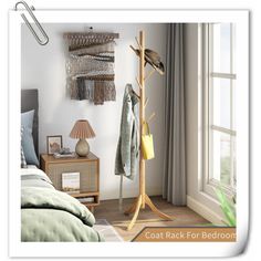 the coat rack for bedroom is made from wood and has two hooks on each side