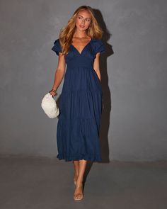 V-neckline Ruffled short sleeves Back tie closure Smocked waist Tiered Lined 95% Cotton 5% Polyester Runs Small Dark Blue Dresses, Western Wear Dresses, Dark Blue Dress, Maxi Dress Navy, Dresses By Length, Tiered Maxi Dress, Spring Summer Dress, Navy Dress, Floral Stripe