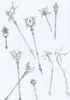 some drawings of different types of swords and wands in various shapes, sizes and colors