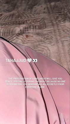 the back side of a bed with pink sheets on top of it and a quote from tahajjud