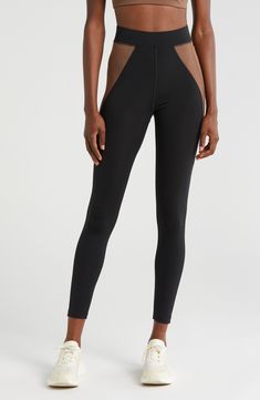 Get active and stay comfy in these colorblocked leggings with an encased elastic waistband and invisible side pocket. Pull-on style Drop-in pockets 80% nylon, 20% spandex Machine wash, tumble dry Imported Functional Nylon Leggings With Contoured Waistband, Sports Leggings With Contoured Waistband, Sporty Fitted Activewear With Contrast Panels, Sporty Nylon Leggings With Contoured Waistband, Nylon Color Block Activewear Athleisure, Stretch Activewear With Contrast Panels For Sports, Functional Black Color Block Activewear, Nylon Color Block Activewear For Training, Nylon Color Block Sportswear Activewear